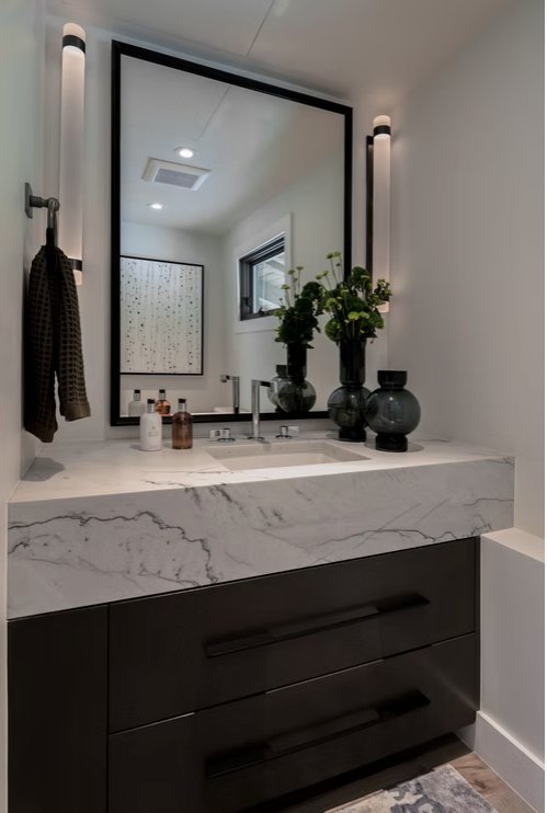 Powder room with marble